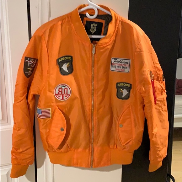 notorious orange bomber jacket